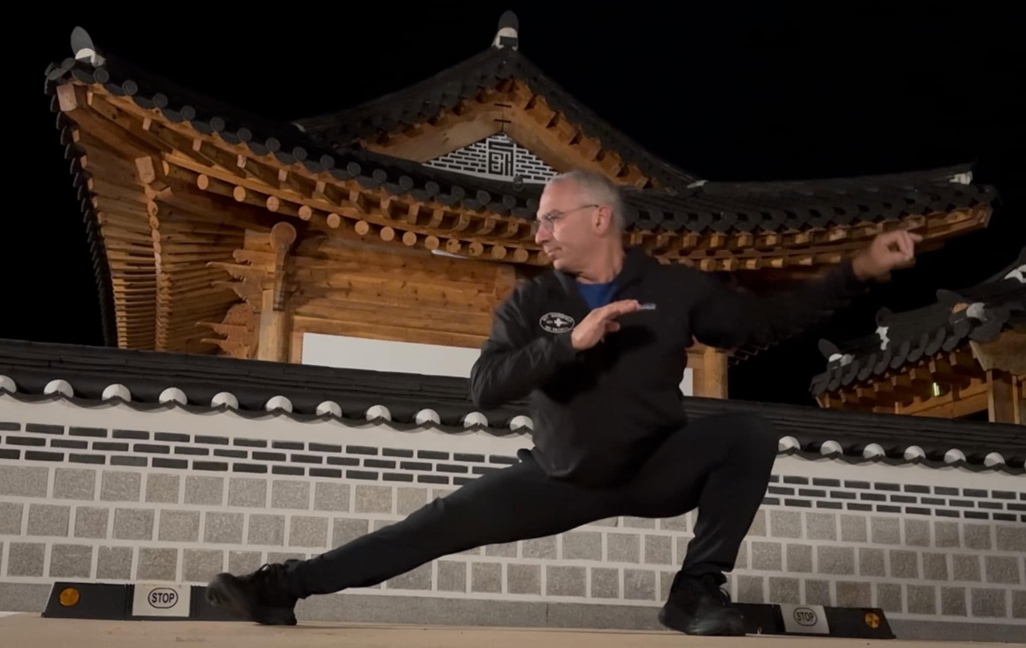 Il Il Shin movement practice in a traditional Korean courtyard